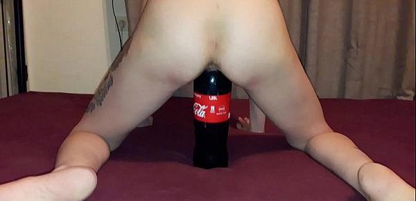  Slut  Lucy rides a huge coke bottle